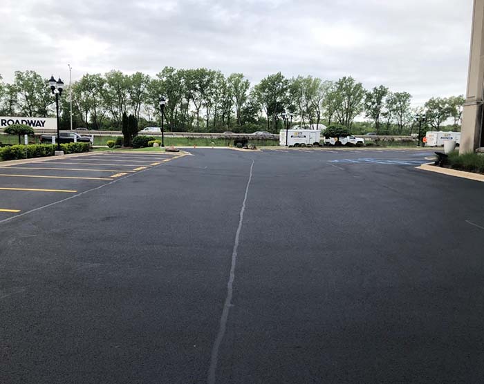 parking lot after crack sealing and striping