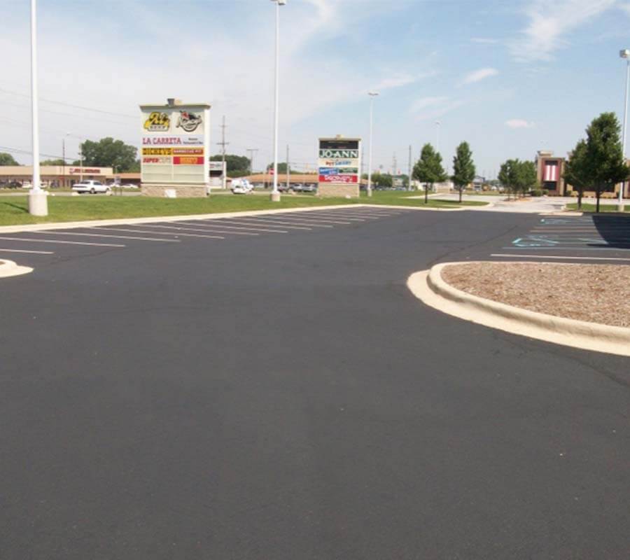Freshly paved and striped commercial parking lot