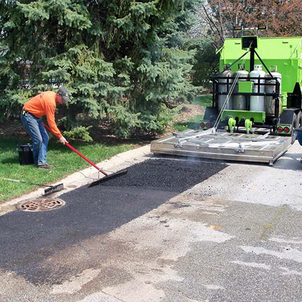 asphalt patching for potholes, shattered or alligatored pavement