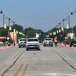 Site Services | A street in Portage, IN, is lined with cones during cracksealing project.