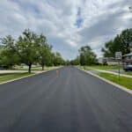 Liquid Road application by Site Services in St. John, Indiana.