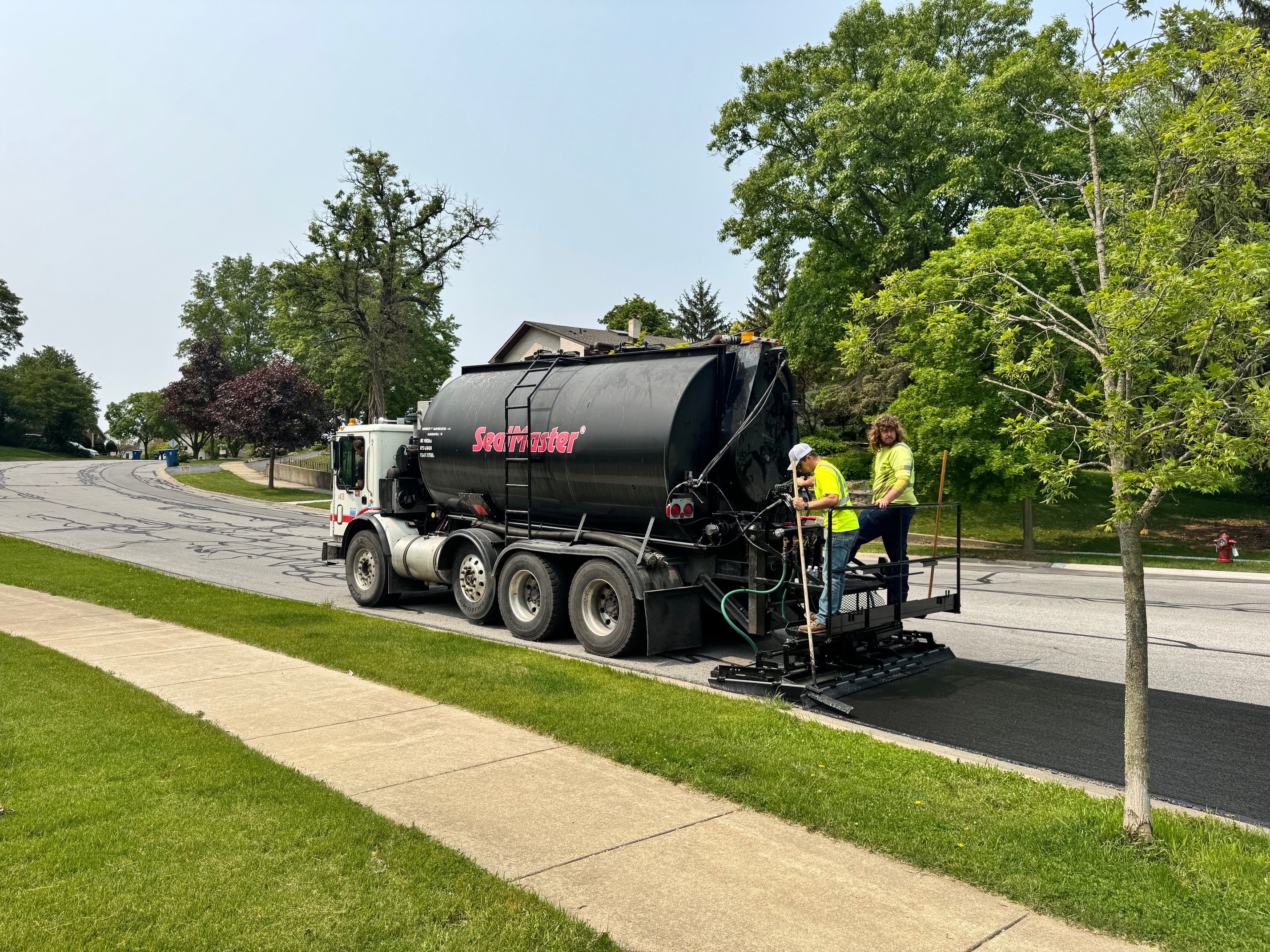 Liquid Road application by Site Services in St. John, Indiana.